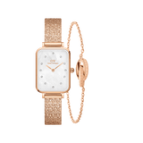 Rectangular Quadro Lumine Pressed Piano ladies watch with a rose gold pressed metal strap and white crystal dial, paired with an Elan Unity Bracelet in rose gold featuring a delicate chain and unity ring detail.