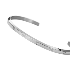 Classic Lumine Bracelet S featuring a slim, polished silver cuff with six sparkling crystals and an open design, crafted for comfortable everyday wear and easy stacking with other jewellery.