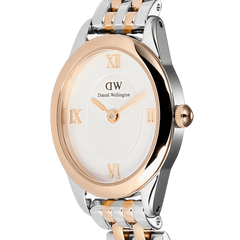 Close-up of the Daniel Wellington Ophelia Mini Two Tone Rose Gold watch, highlighting its slim oval case, white dial with rose gold Roman numerals, and polished two-tone rose gold and silver bracelet.