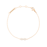 Delicate rose gold bracelet featuring a fine adjustable chain and an infinity charm set with sparkling white cubic zirconia stones, designed for a refined and timeless look.
