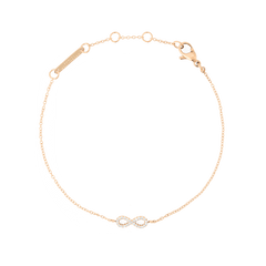 Delicate rose gold bracelet featuring a fine adjustable chain and an infinity charm set with sparkling white cubic zirconia stones, designed for a refined and timeless look.