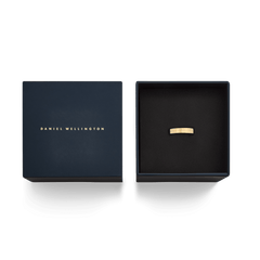 Line Ring Polished Gold 4.5mm presented in an elegant Daniel Wellington gift box, highlighting its classic gold finish and sophisticated packaging for special occasions.