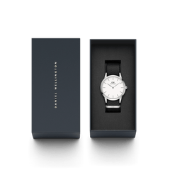 Iconic Black NATO White Dial watch presented in a sleek Daniel Wellington gift box, featuring a minimalist white dial, silver case, and black NATO strap ideal for gifting or adding to your collection.