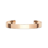 A minimalist rose gold cuff bracelet with a polished finish and open-ended design, featuring a slim, smooth silhouette suitable for both men and women.