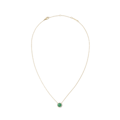 Gold necklace with a delicate chain featuring a round jade pendant framed by white cubic zirconia crystals, designed for a refined and modern look.