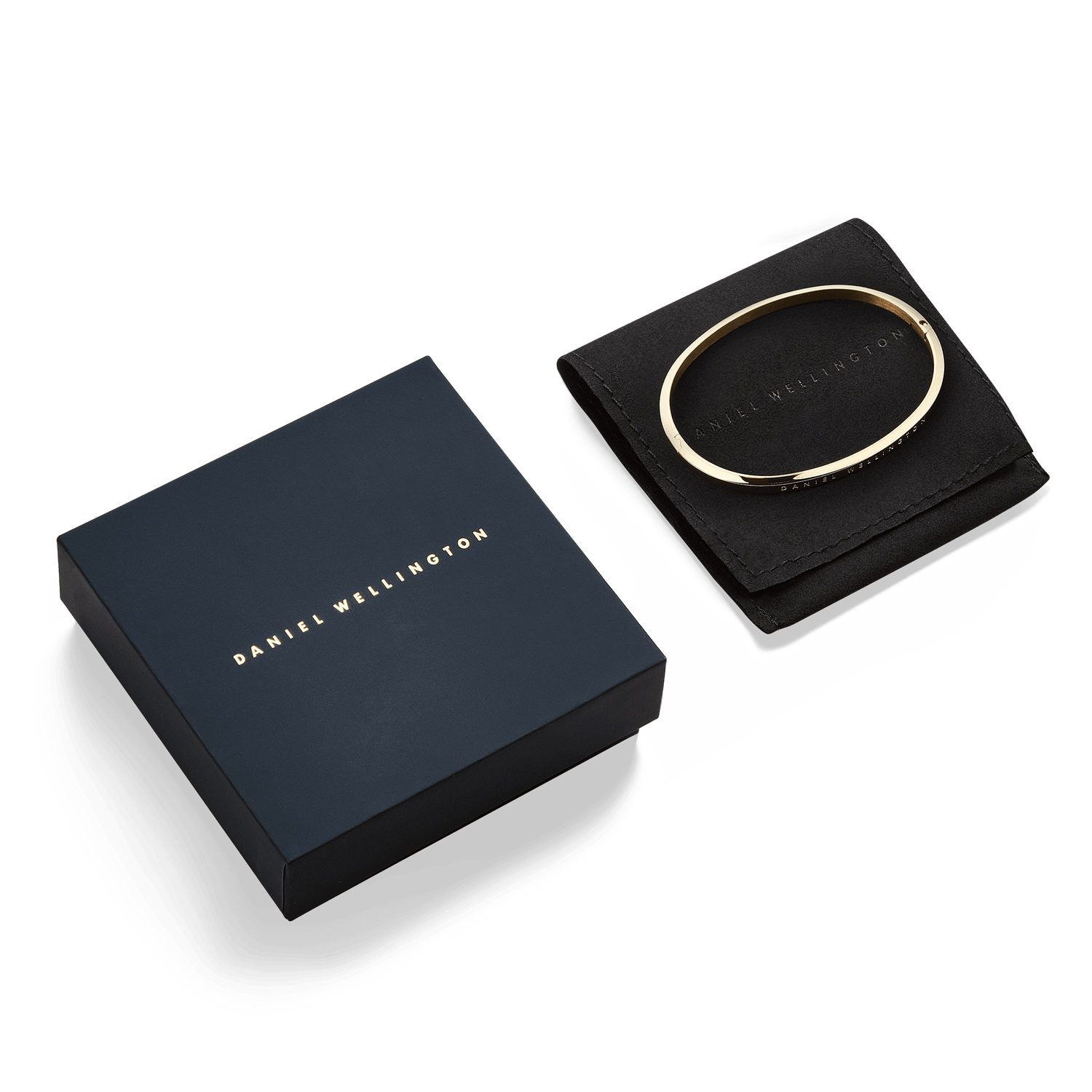 Classic Bangle Gold is presented on a black pouch next to a navy Daniel Wellington gift box, highlighting its polished gold finish and elegant packaging suitable for gifting.