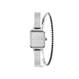 Rectangular silver Daniel Wellington Quadro Reflection watch with a slim mesh strap, paired with a Classic Tennis Bracelet featuring sparkling stones and a delicate profile, both designed for women seeking elegant and contemporary style.