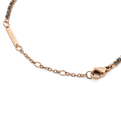 Detail view of the Classic Tennis Bracelet Nightfall Rose Gold showing the rose gold lobster clasp, adjustable sizing rings, and individually set dark Preciosa crystals for a secure and elegant finish.
