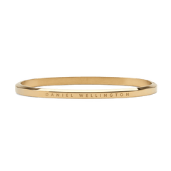 Classic Bangle Gold features a slim, polished gold finish with the Daniel Wellington logo engraved along the outer edge, showcasing its minimalist and timeless design.