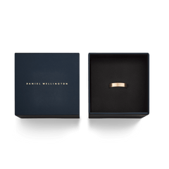 Line Ring Brushed Rose Gold 4.5mm presented in an elegant Daniel Wellington gift box, highlighting its modern brushed rose gold finish and classic band style, ideal for gifting.