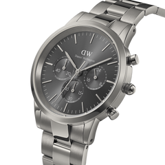 Iconic Chronograph Link Graphite men's watch with a brushed stainless steel bracelet, sunray grey dial, and three chronograph sub-dials, shown in a close-up angled view highlighting its modern and versatile design.
