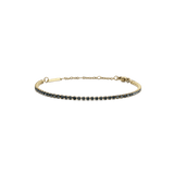 Classic Tennis Bracelet Nightfall Gold featuring a slim gold band set with deep-coloured Preciosa crystals, adjustable chain and lobster clasp, designed for a refined and elegant look.