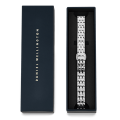 5-Link Strap Silver watch strap with polished stainless steel links and butterfly clasp, presented in a navy Daniel Wellington gift box.
