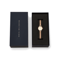 Petite Mini Champagne Melrose watch with a champagne dial and rose gold mesh strap, elegantly presented in a branded Daniel Wellington gift box.