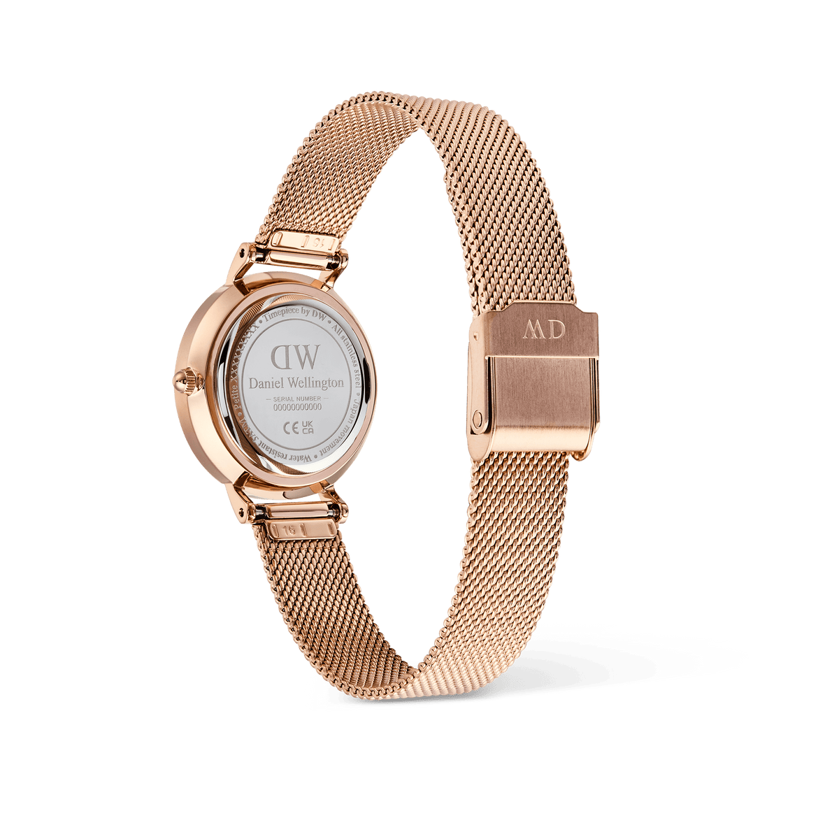 Rear view of the Petite Roman Numerals Date Rose Gold watch showing the engraved case back, rose gold mesh strap, and fold-over clasp designed for a secure and comfortable fit.