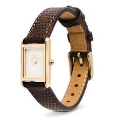 Bound Mini Dark Brown Lizard Rose Gold watch with a rectangular rose gold case, minimalist white dial, and a textured dark brown lizard-grain leather strap featuring a pin buckle closure.