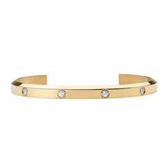 Slim gold cuff bracelet with a polished finish, featuring eight evenly spaced cubic zirconia stones set along the band for a refined and elegant look.