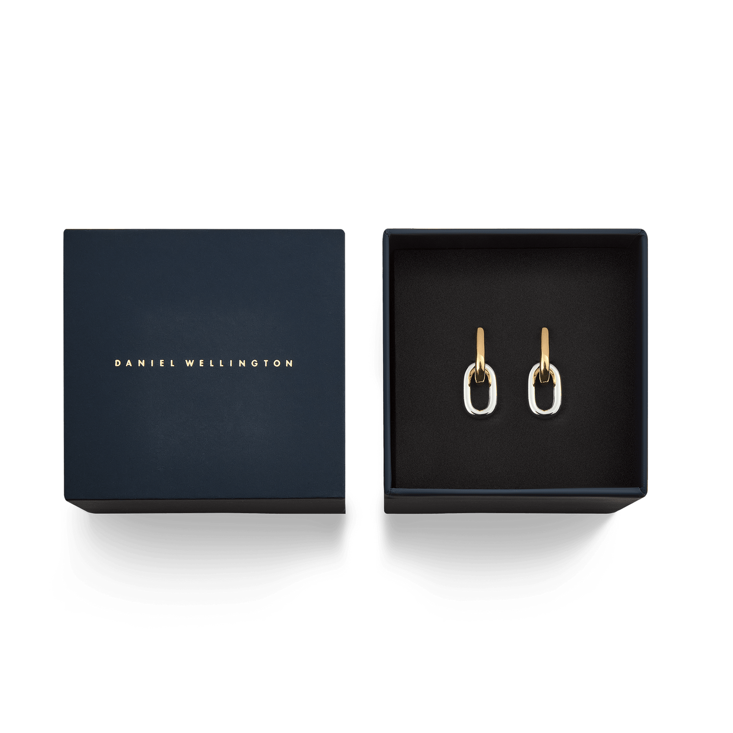 Contrast Link Earrings Two Tone Gold displayed in a Daniel Wellington gift box, featuring polished gold and silver links with a modern, architectural design.
