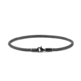 Slim graphite mesh bracelet with a secure lobster clasp, crafted from high quality stainless steel and featuring a minimalist, contemporary design suitable for both men and women.