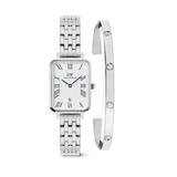 Rectangular silver ladies watch with a five-link stainless steel strap, Roman numeral dial, and blue hands, paired with a sleek silver cuff bracelet featuring sparkling crystal accents.