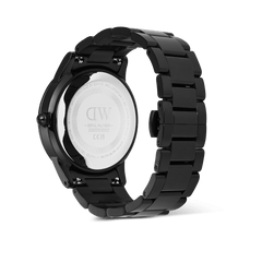 Back view of the Iconic Paradigma Link Black watch showing the engraved stainless steel case back, robust black three-link bracelet, and secure butterfly clasp.
