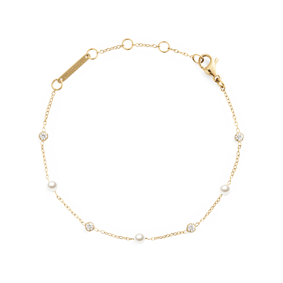 Slim gold chain bracelet featuring alternating white Swarovski glass pearls and cubic zirconia stones, with an adjustable clasp for a comfortable fit.