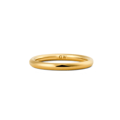 A slim, rounded gold ring with a high-polish finish, featuring a discreet inner logo and a minimalist design suitable for stacking or wearing alone.