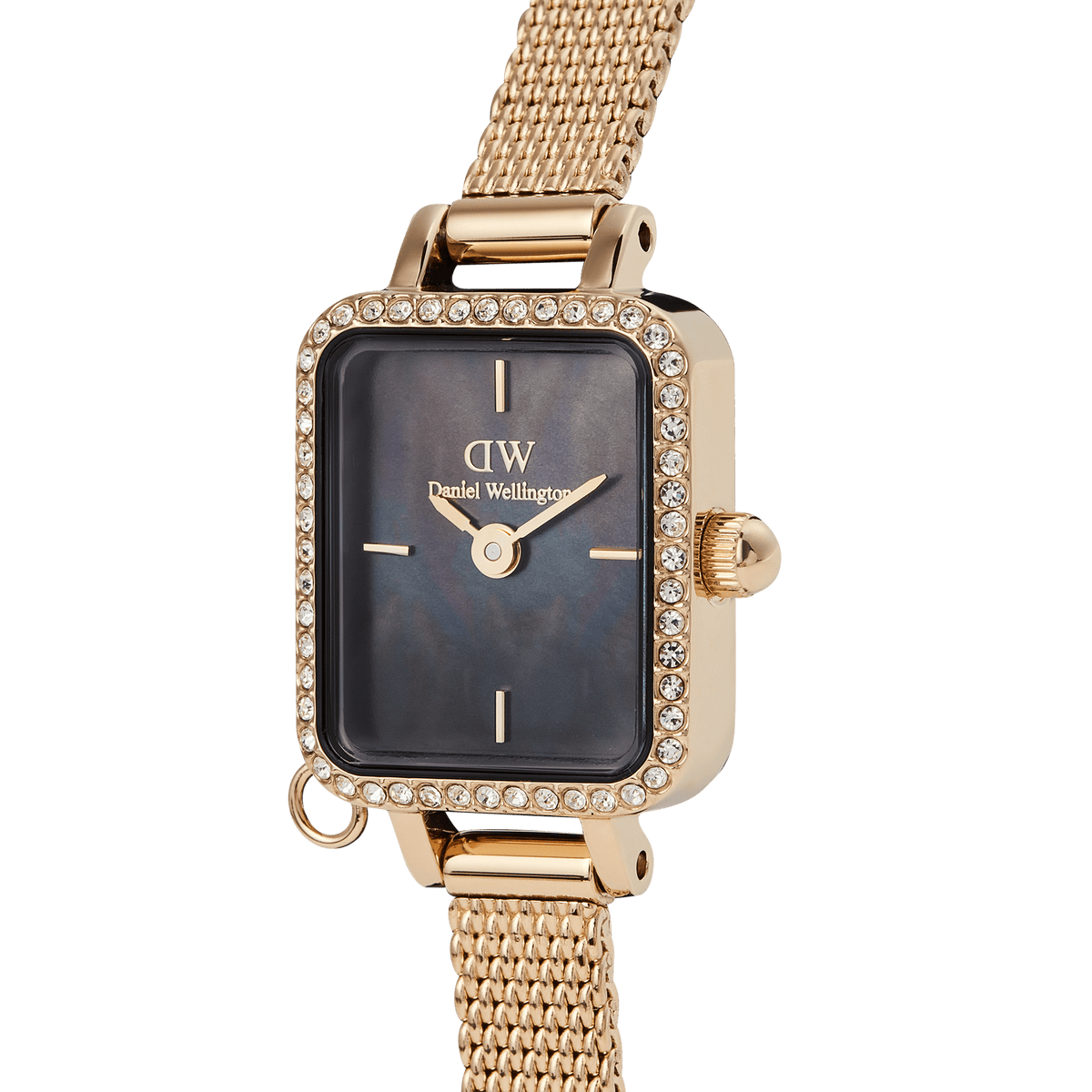 Close-up of the Daniel Wellington Quadro Mini Crystal Zodiac Evergold Set, highlighting the rectangular gold case with sparkling crystals, black mother of pearl dial, and the fine gold mesh strap.