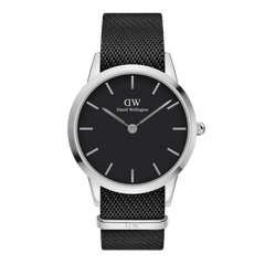 Classic Daniel Wellington Iconic Black NATO Black Dial watch with a minimalist black dial, polished silver case, and textured black NATO strap, featuring slim hour markers and a clean, modern design.