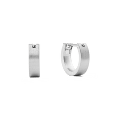 A pair of small brushed silver hoop earrings with a 3.5 mm width, featuring a modern, minimalist design and secure latch-back closure, crafted from stainless steel.