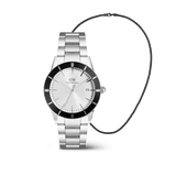 The Iconic Paradigma & Tide Mesh Necklace Black Set features a classic silver Daniel Wellington men’s watch with a bold black bezel and stainless steel strap, paired with a minimalist black mesh chain necklace for a modern, coordinated look.