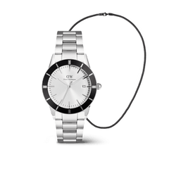 The Iconic Paradigma & Tide Mesh Necklace Black Set features a classic silver Daniel Wellington men’s watch with a bold black bezel and stainless steel strap, paired with a minimalist black mesh chain necklace for a modern, coordinated look.