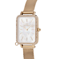 Close-up of the Quadro Crystal Zodiac Evergold Set gold ladies watch by Daniel Wellington, featuring a rectangular crystal-set bezel, white mother of pearl dial, minimalist gold hour markers, and an elegant gold mesh strap.