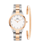 Rose gold and silver Iconic Link Lumine watch with a white dial and crystal hour markers, paired with a slim rose gold Lumine Bracelet featuring crystal accents, both crafted from stainless steel for a coordinated and elegant look.