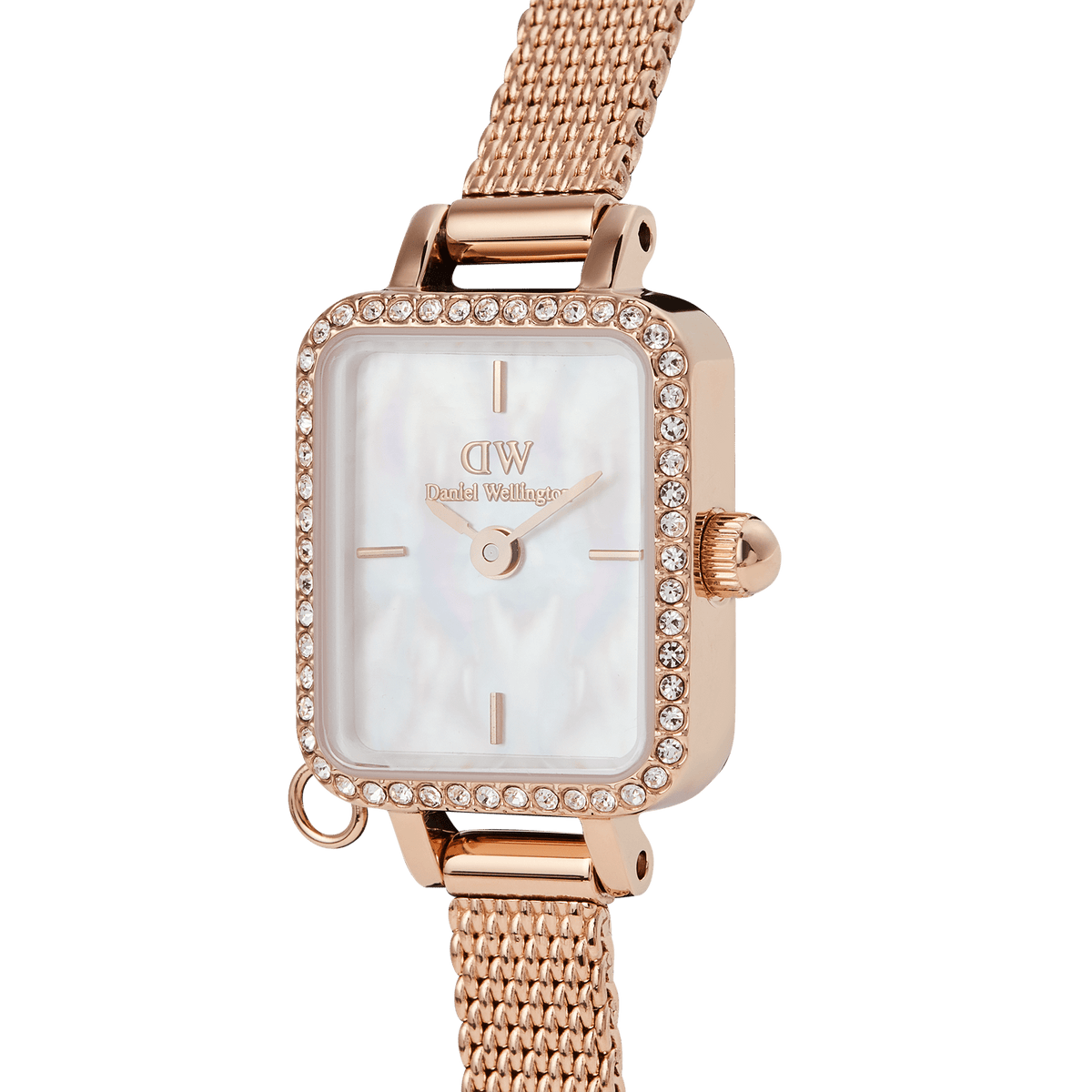 Close-up of the Quadro Mini Crystal Zodiac Melrose Set watch, showcasing a rose gold rectangular case with a crystal-framed bezel, white mother of pearl dial, and a fine rose gold mesh strap.