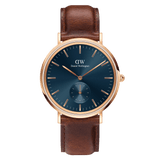 Classic Multi-Eye St Mawes Arctic Rose Gold men's watch featuring a round rose gold case, minimalist blue dial with chronograph subdial, and a brown leather strap.