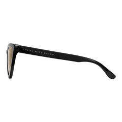 Lynx Bio-Acetate Black/Yellow sunglasses with a glossy black cat eye frame, yellow nylon lenses, and Daniel Wellington branding on the arm, highlighting the designer finish and sustainable materials.