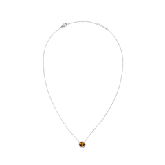 Silver necklace with an adjustable chain, featuring a domed tiger eye stone pendant surrounded by white cubic zirconia crystals.
