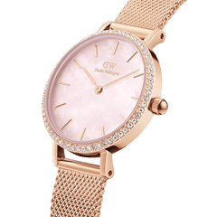 Close-up of the Petite Lumine Bezel Melrose Pink MOP ladies watch, showing its rose gold mesh strap, crystal-set bezel, and pink mother of pearl dial with minimalist hour markers.