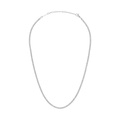 Classic Tennis Necklace Silver featuring individually set crystals and a sleek silver-plated finish, shown with an adjustable clasp for versatile styling.
